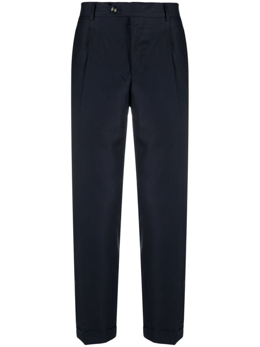 Tailored trousers with pleats