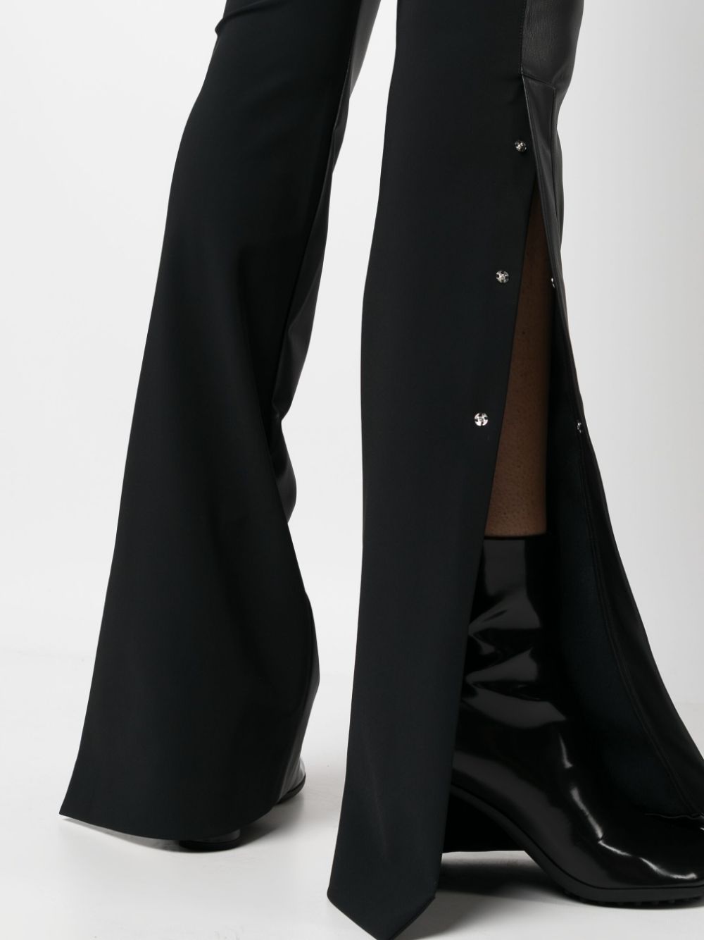 Flared trousers with inserts