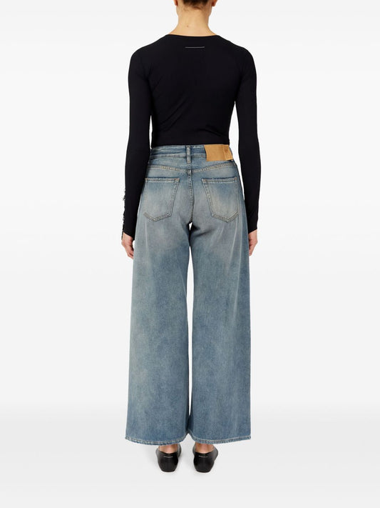 Jeans a gamba ampia con effetto vissuto 