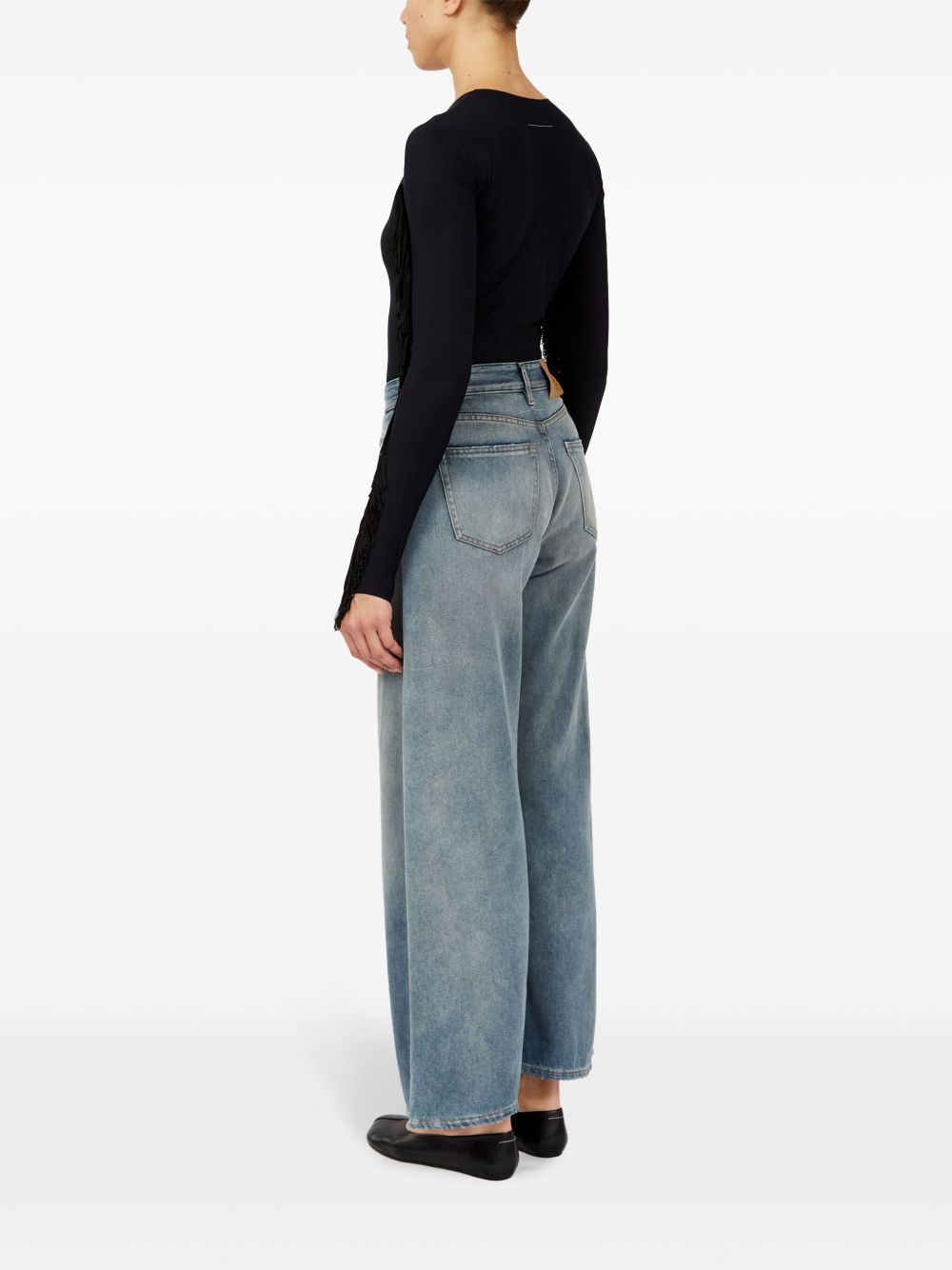 Jeans a gamba ampia con effetto vissuto 