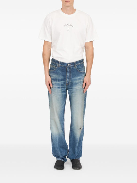 Pantaloni effetto vissuto 