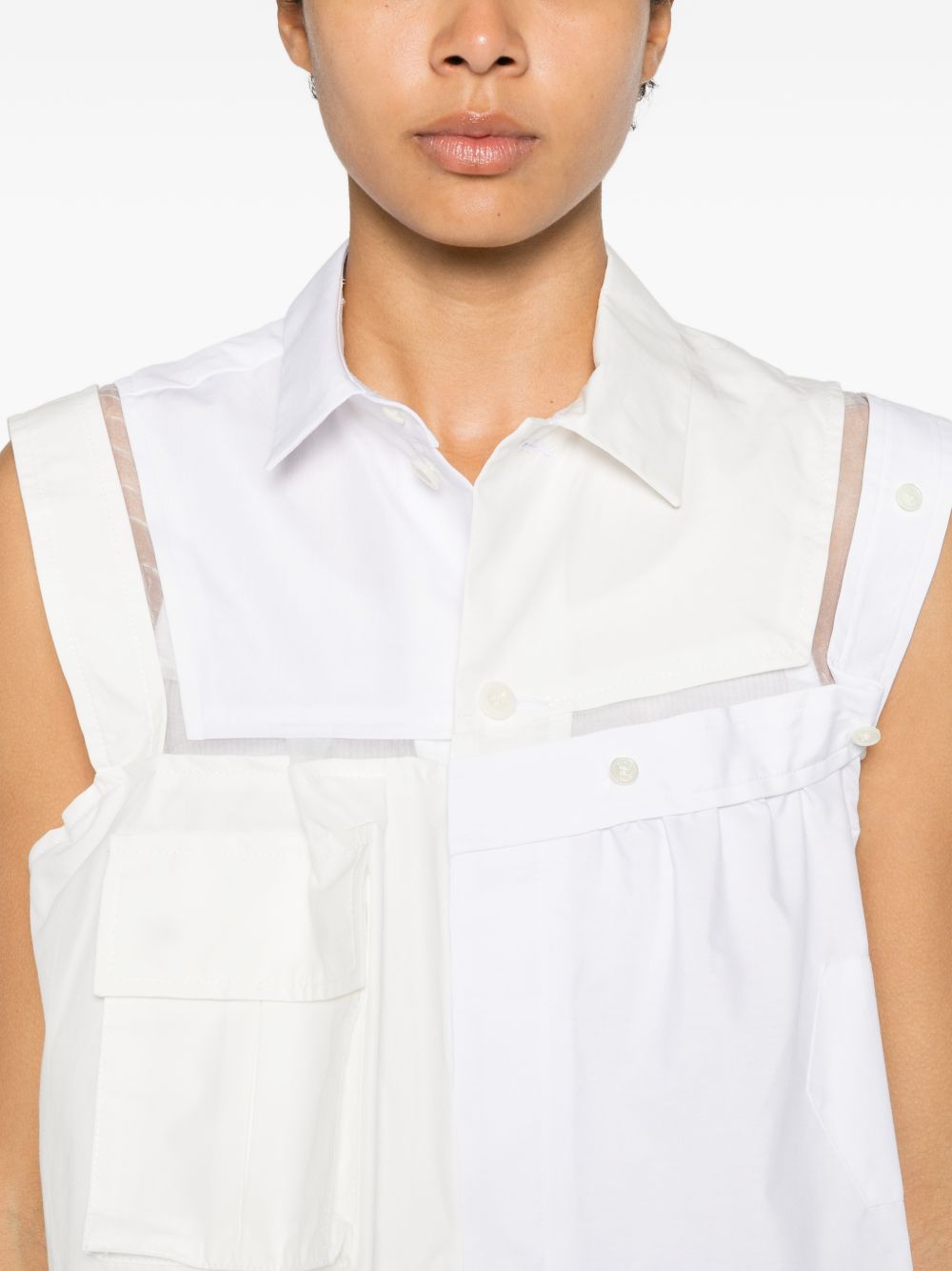 Top asimmetrico decostruito 