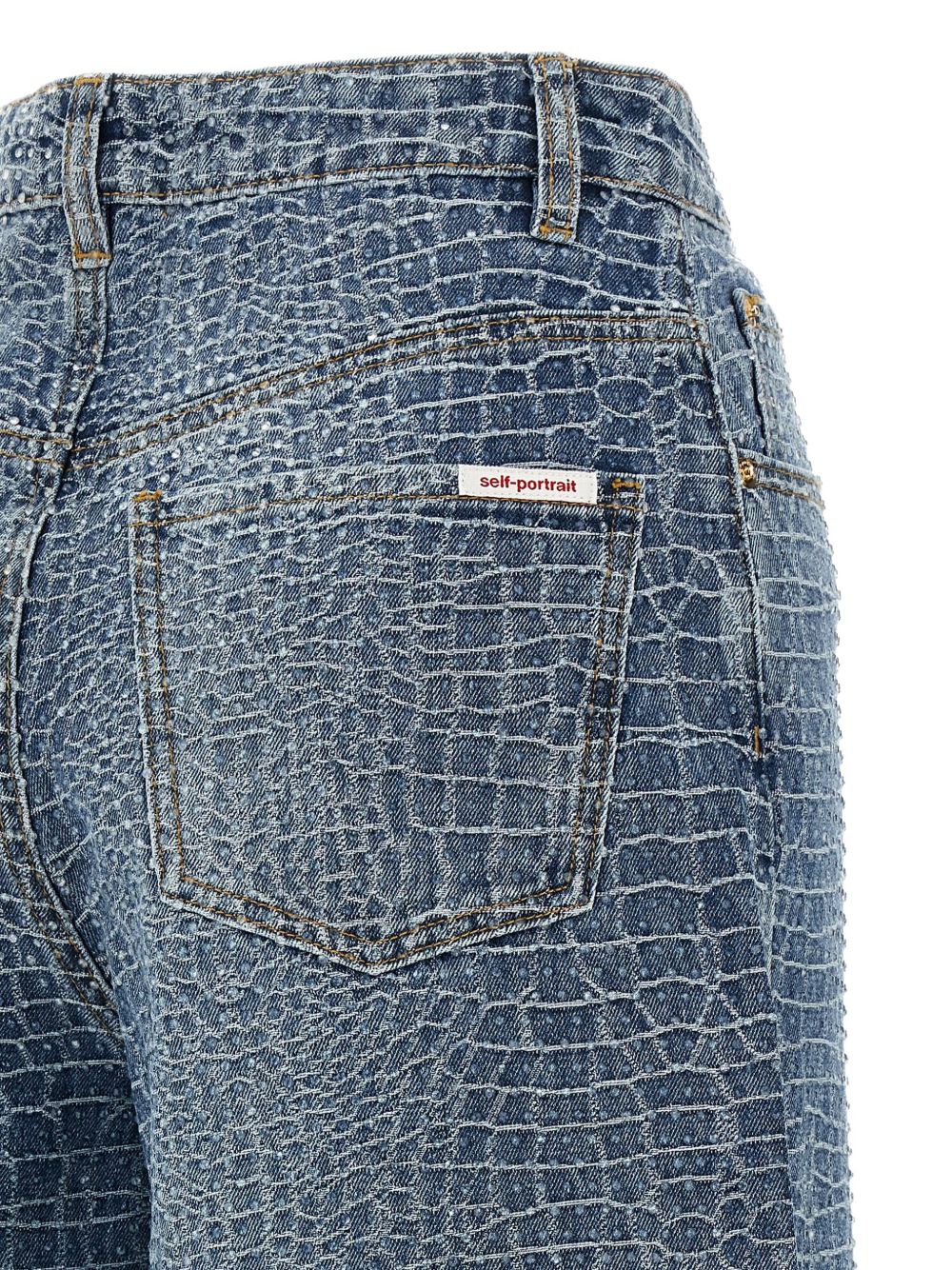 Jeans con effetto coccodrillo 