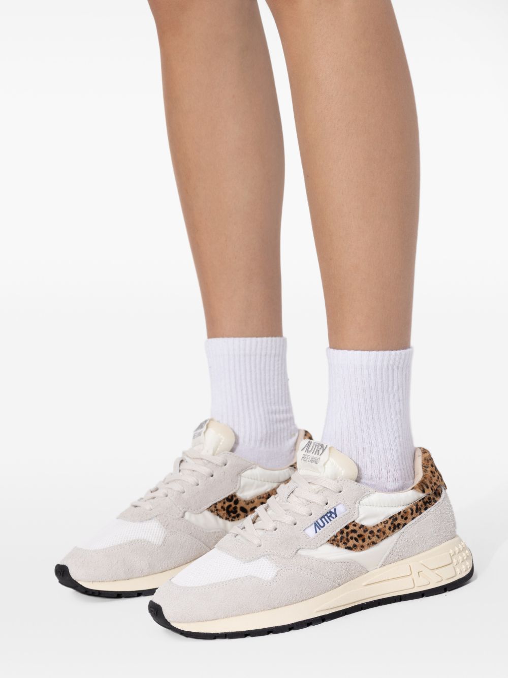 Sneakers basse Reelwind in nylon e camoscio, colore bianco e leopardato 