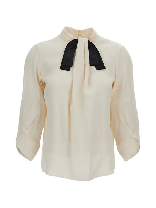 Blusa con fiocco a maniche lunghe 